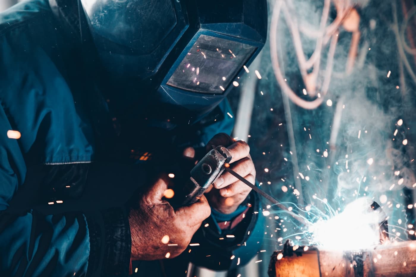 Welder working on steel fabrication
