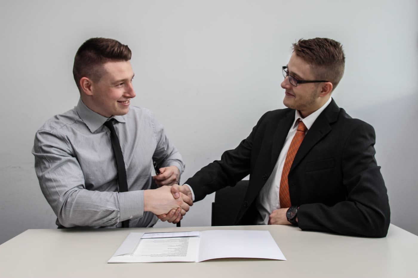 Business partners shaking hands